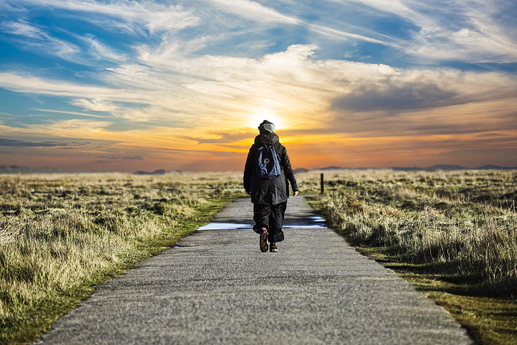 Walking alone on a pathway